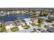 Beautiful aerial view of a residential neighborhood and the lake at 2263 Mallard Creek Cir, Kissimmee, FL 34743