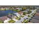 Beautiful aerial view of a residential neighborhood and the lake at 2263 Mallard Creek Cir, Kissimmee, FL 34743
