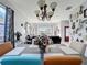 Dining room featuring decorative chandelier lighting and seating for six people at 2263 Mallard Creek Cir, Kissimmee, FL 34743