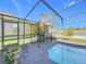 Screened-in pool area with a gazebo and view of the lake at 2263 Mallard Creek Cir, Kissimmee, FL 34743