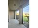 Enclosed patio with views of the yard and neighboring houses at 2355 Seven Oaks Dr, St Cloud, FL 34772