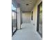 Covered patio with concrete flooring and glass doors at 2355 Seven Oaks Dr, St Cloud, FL 34772