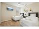 This cheerful bedroom features two twin beds, a window, and cartoon decor at 2551 Dharma Cir, Kissimmee, FL 34746
