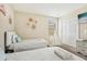 This bedroom features two cozy twin beds, a tent, and a large closet at 2551 Dharma Cir, Kissimmee, FL 34746