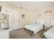 This charming bedroom offers two twin beds with a playful princess theme at 2551 Dharma Cir, Kissimmee, FL 34746
