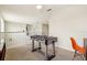 This upstairs game room includes a foosball table and a view of the home's interior at 2551 Dharma Cir, Kissimmee, FL 34746
