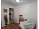 A dining room with wood floors and a vintage popcorn machine at 261 N Third St, Winter Springs, FL 32708