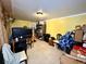 Functional bedroom space with a neutral tiled floor and basic furnishings at 281 San Gabriel St, Winter Springs, FL 32708