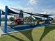 Vibrant community playground featuring slides, a lighthouse tower, and shaded play areas at 281 San Gabriel St, Winter Springs, FL 32708