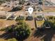 Aerial view showing a new construction home's location in a neighborhood near a road at 325 Marion Oaks Trail, Ocala, FL 34473