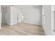 Bright and airy bedroom with light wood flooring and neutral walls at 325 Marion Oaks Trail, Ocala, FL 34473