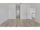 Hallway view toward kitchen, showcasing the light and open layout at 325 Marion Oaks Trail, Ocala, FL 34473