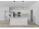 Stylish kitchen featuring a large island, stainless appliances, and contemporary finishes for culinary enthusiasts at 325 Marion Oaks Trail, Ocala, FL 34473