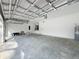 Spacious two-car garage with high ceilings and ample storage space at 333 Bahia Cir, Longwood, FL 32750