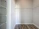 Spacious walk-in closet offers ample storage with built-in shelving at 333 Bahia Cir, Longwood, FL 32750