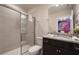 Bathroom featuring a shower, toilet, granite countertop, dark wood cabinetry, and a mirror at 4157 Lana Ave, Davenport, FL 33897