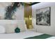 Close up of luxury bedroom, with modern artwork, gold accents and decor at 4157 Lana Ave, Davenport, FL 33897