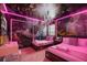 Imaginative themed bedroom with a fantasy mural, unique lighting, and comfortable twin beds at 4157 Lana Ave, Davenport, FL 33897