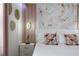 Up close view of an ornate bedroom with custom headboard and modern decor at 4157 Lana Ave, Davenport, FL 33897