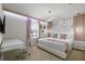 Cozy bedroom with modern decor, desk and chair, and natural light at 4157 Lana Ave, Davenport, FL 33897