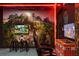 A game room has a flat screen TV, and Minecraft theme decor at 4157 Lana Ave, Davenport, FL 33897