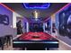 A Star Wars themed game room that includes a pool table, wall decorations, and cozy couches at 4157 Lana Ave, Davenport, FL 33897