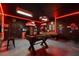 A themed Gathering game room has a foosball table, pool table, and flat screen TVs at 4157 Lana Ave, Davenport, FL 33897