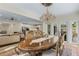 Elegant dining room with chandelier, view of the kitchen, and stylish decor at 421 E Gore St, Orlando, FL 32806