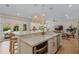 Kitchen with island and stool seating, stainless steel appliances, and open floor plan at 421 E Gore St, Orlando, FL 32806