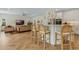 Gourmet kitchen featuring a large island, pendant lighting, and modern appliances at 421 E Gore St, Orlando, FL 32806