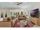 Open-concept living room seamlessly connects to dining area, providing ample space for entertaining and relaxation at 421 E Gore St, Orlando, FL 32806