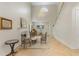 Bright living room featuring a staircase, a fireplace and an adjacent sitting area with a grand chandelier at 421 E Gore St, Orlando, FL 32806