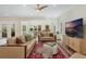 Open-concept living room seamlessly connects to dining area, providing ample space for entertaining and relaxation at 421 E Gore St, Orlando, FL 32806