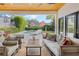 Comfortable outdoor space with ceiling fans, a view of the pool and backyard at 421 E Gore St, Orlando, FL 32806