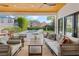 Comfortable outdoor space with ceiling fans, a view of the pool and backyard at 421 E Gore St, Orlando, FL 32806