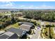 A neighborhood view highlighting well-kept lawns and landscaping, with natural scenery at 5159 Twin Lakes Blvd, St Cloud, FL 34772