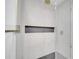 Modern shower with a glass door and a sleek stone shower at 6593 Queens Borough Ave # 202, Orlando, FL 32835