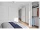 Bedroom featuring hardwood floors, recessed lighting, and a closet with organization at 6744 Willow View Ave, Orlando, FL 32829