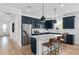 This spacious kitchen has a large island, stainless steel appliances, and room to entertain at 6744 Willow View Ave, Orlando, FL 32829