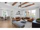 This light-filled living room has a large window, comfortable seating, and an open layout at 6744 Willow View Ave, Orlando, FL 32829