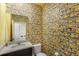 Fun bathroom featuring minion themed wallpaper, granite countertops, and a modern sink at 7845 Oak Reflection Loop, Davenport, FL 33837