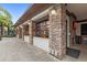 Picturesque outdoor bar area with stone columns and counter and convenient seating at 7845 Oak Reflection Loop, Davenport, FL 33837