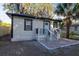 Charming home featuring a light blue front door and a brick entryway at 812 S Locust Ave, Sanford, FL 32771