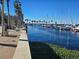 Scenic view of a marina lined with palm trees and sailboats on a clear day at 812 S Locust Ave, Sanford, FL 32771