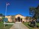 The Sanford Museum under a clear sky, displaying its classic architecture and surrounding greenery at 812 S Locust Ave, Sanford, FL 32771