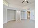 Bright bedroom with built-in closets and doorway at 8922 Bay Cove Ct, Orlando, FL 32819