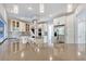 Spacious kitchen with stainless appliances, center island, light cabinets, and stylish backsplash at 8922 Bay Cove Ct, Orlando, FL 32819