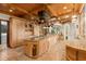Spacious kitchen with custom cabinets, a large island, and designer accents at 9291 Point Cypress Dr, Orlando, FL 32836