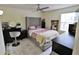 Cozy bedroom with a comfortable bed, soft lighting, and chic decorative accents at 974 Leeward Pl # 205, Altamonte Springs, FL 32714