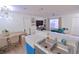 A view of the living room showcasing an open floor plan to the kitchen and dining area at 974 Leeward Pl # 205, Altamonte Springs, FL 32714